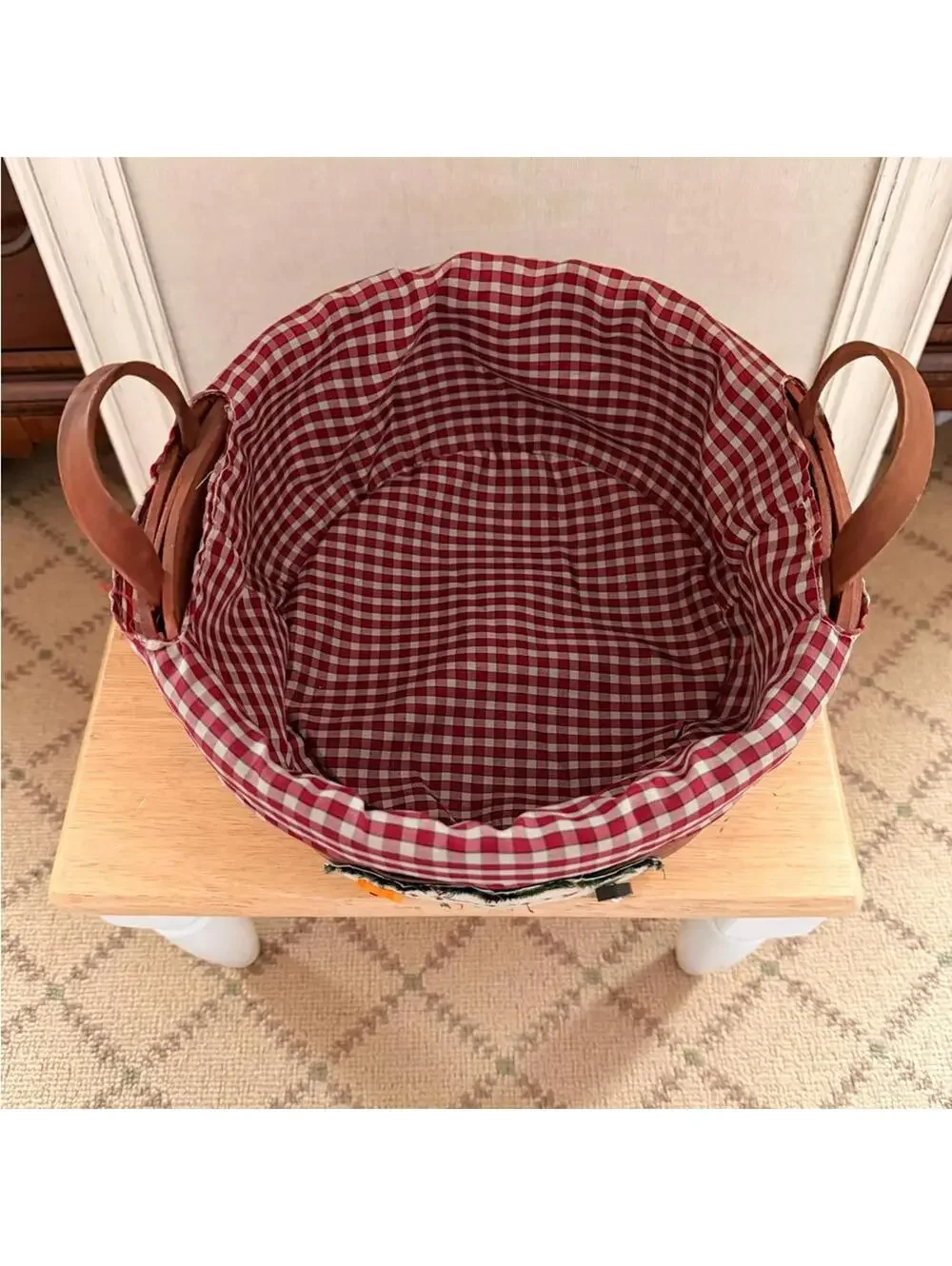 Vintage Country charm Christmas holiday basket with a red gingham fabric liner.